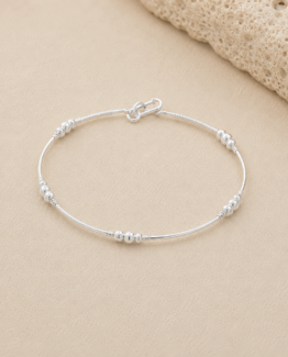 Pulsera Barra Tubo con Bolitas — Plata 950 Minimalista